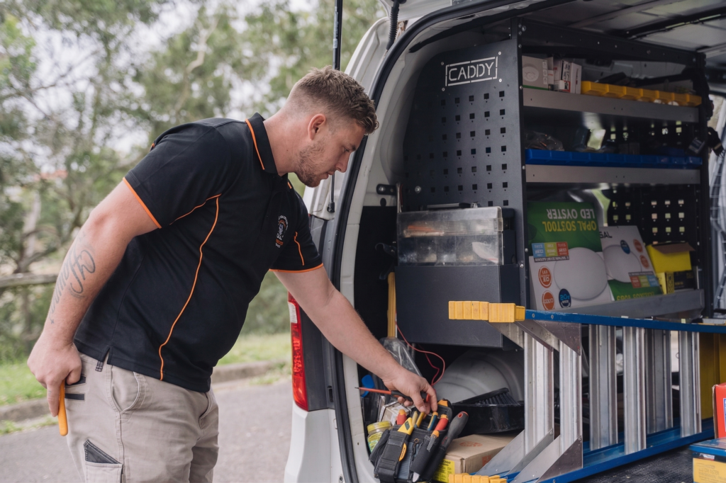 Licensed Illawong electrician working on a residential job